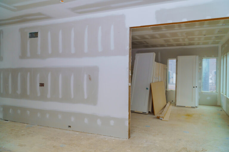 Boston Painting providing expert drywall installation and repair services.