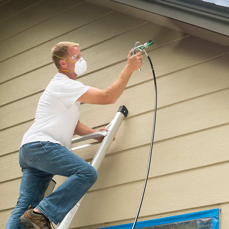 Boston Painting providing expert exterior house painting services, including siding, decks, and railings.